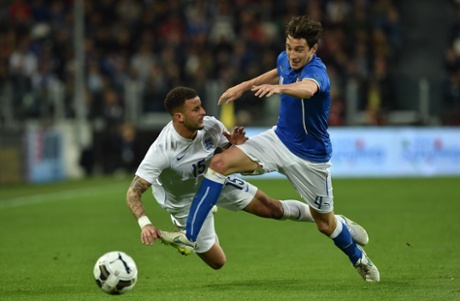Matteo Darmian brushes aside the challenge of Kyle Walker.