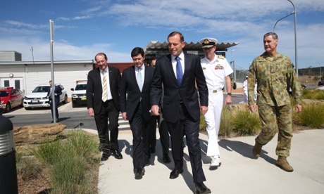 The Prime Minister Tony Abbott and Defence. Minister Kevin Andrews tour the Joint Operations Command Centre (JOCC) outside Canberra.