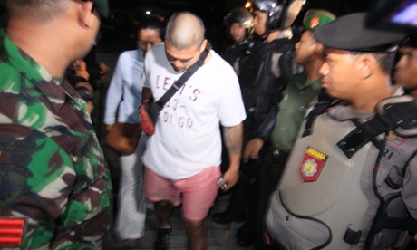 Michael Chan, the brother of Andrew Chan walks to visit him before the transfer.