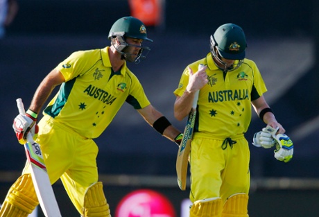 Glenn Maxwell consoles team mate Steve Smith, who was dismissed for 95 runs.