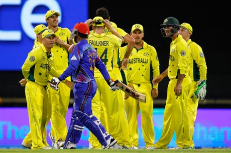 Australia celebrates after taking the wicket of Javed Ahmadi.