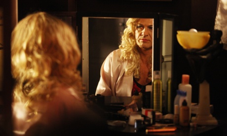 Sean Bean as Tracie Tremarco, a character based on Roger Hill's alter ego Mandy Romero.