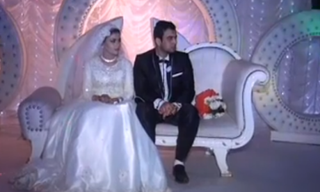 Egyptian bride and groom before he sprang Isis kidnap prank on her
