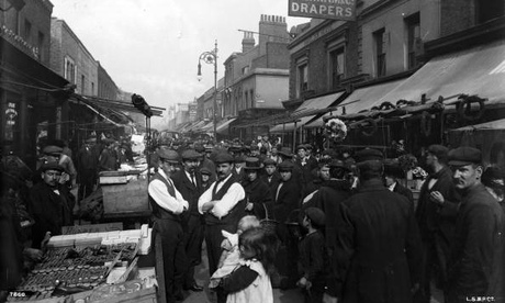 The crowded East End ... Chrisp Street market in Poplar, 1904. Photograph: London Stereoscopic Compa