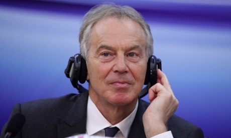 Tony Blair listens to a translation during talks in Hanoi, Vietnam, on 4 March.