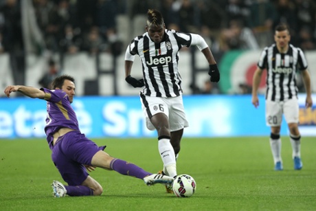 Fiorentina's Milan Badelj attempts to stop Paul Pogba.
