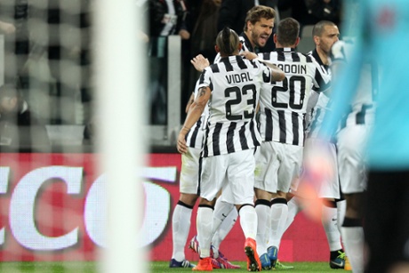 Juventus' Javier Fernando Torres Llorente celebrates with his teammates.