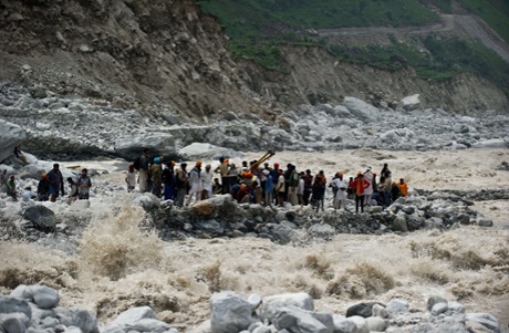 Stranded pilgrims wait to be rescued at Govind Ghat, Uttarakhand.