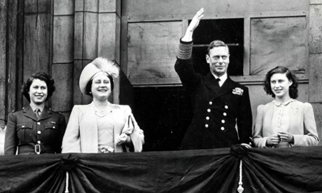 Princess Elizabeth (now the Queen), Queen Elizabeth (later the Queen Mother), King George VI and Princess Margaret on a balcony at Buckingham Palace in London during VE Day celebrations in 1945.