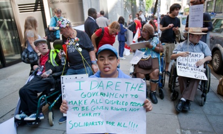 People with disabilities protest outside the Department of Work and Pensions, London.
