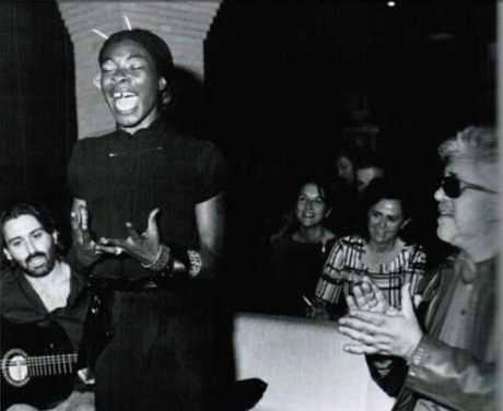 Buika and Pedro Almodóvar (right) at the wrap party for The Skin I Live In