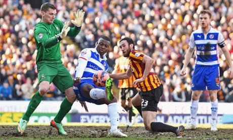 Much to the chagrin of the Reading fans, Yakubu Aiyegbeni is denied a chance to score by Bradford goalkeeper Ben Williams.
