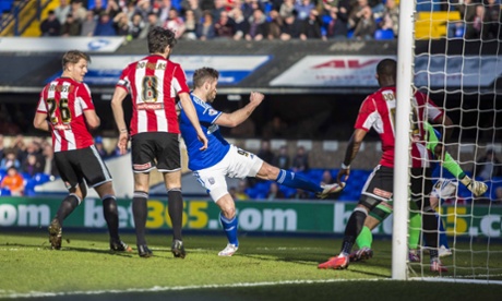 Ipswich's Daryl Murphy opens the scoring against Brentford.