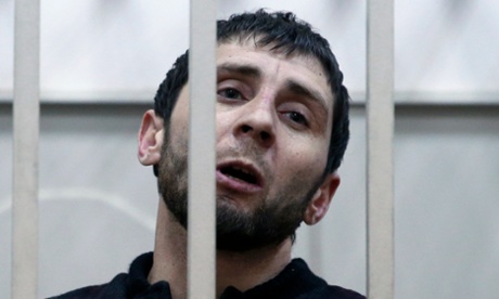 Zaur Dadayev, charged with involvement in the murder of Boris Nemtsov, inside a defendants’ cage in a court building in Moscow.