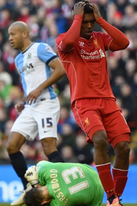 Daniel Sturridge reacts after missing a chance on a goal saved by Blackburn's goalkeeper Simon Eastwood.