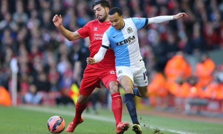 Emre Can competes with Marcus Olssonduring the FA Cup Quarter Final