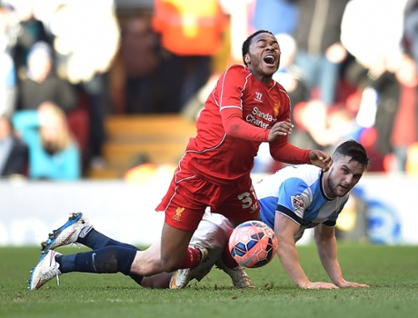 Raheem Sterling is tackled by Craig Conway.