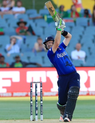 England's Ian Bell goes over the infield.