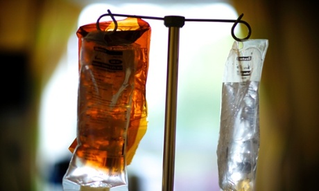 Bags of chemotherapy drugs hanging from a drip stand
