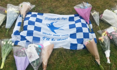 Floral tributes outside Ysgol Bro Morgannwg in Barry, for the victims of last Saturday's crash near Storey Arms, Brecon.