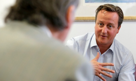 David Cameron on a visit to the children's cancer ward at the John Radcliffe Hospital, Oxford, in September 2013.