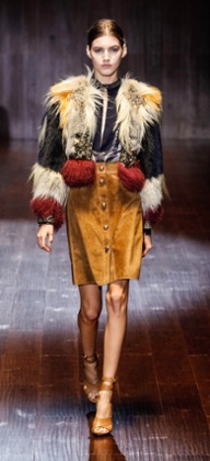 A model does suede on the Gucci catwalk