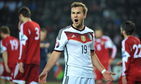 Mario Götze of Germany reacts to his team-mate’s goal during their Group D qualifying win in Georgia.