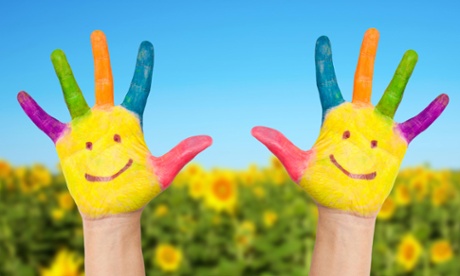 Painted hands with smiley faces