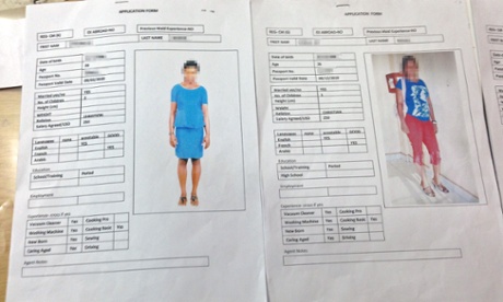The profiles of workers from west Africa are presented by a recruitment agent at an office near Kuwait City. The agent said he could acquire a woman from Cameroon within 10 days.