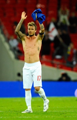 A hairless David Beckham on pitch during a World Cup qualifier in 2009