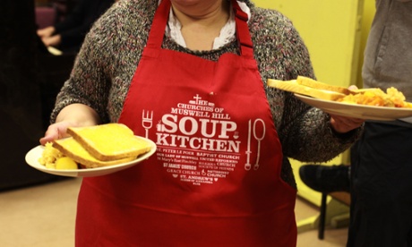 Woman volunteering in soup kitchen