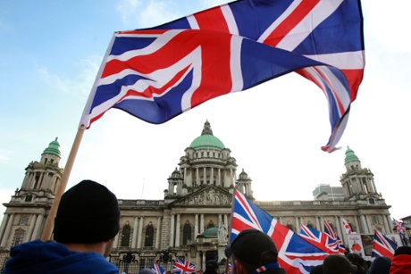 Loyalist protesters hold union flags