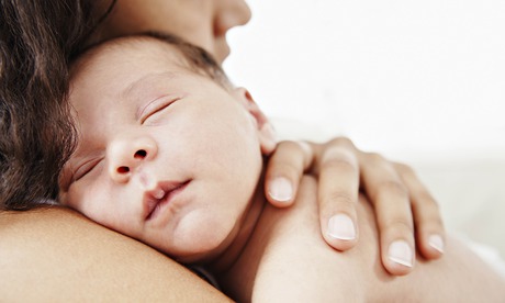 mother and sleeping baby