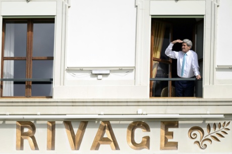 US secretary of state John Kerry looks at the view of Lake Geneva from his hotel room at the Iran nuclear talks in Lausanne, Switzerland.
