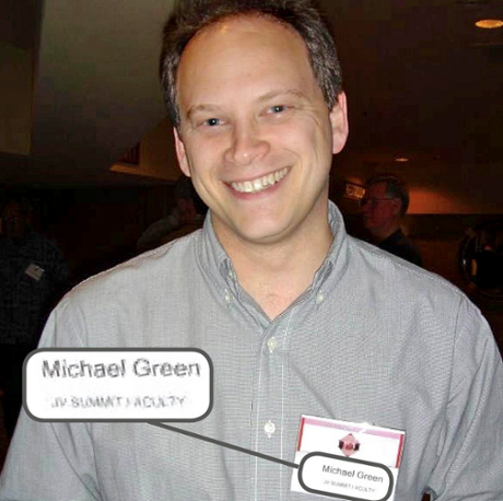 Grant Shapps wears a Michael Green name badge.