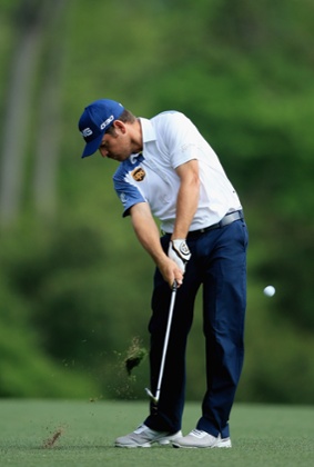 Louis Oosthuizen chips one in.
