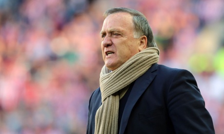 Dick Advocaat relays instructions during Sunderland's 1-0 win over Newcastle, complete with lucky brown scarf.
