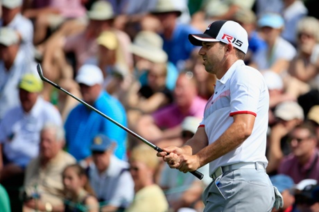 Sergio Garcia watches his shot.