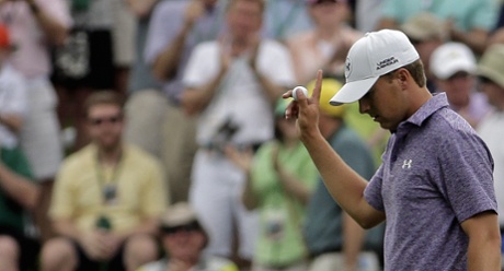 Jordan Spieth acknowledges applause after a birdie on the 10th.
