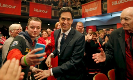 Ed Miliband arrives at an election campaign event in Warrington, north west England