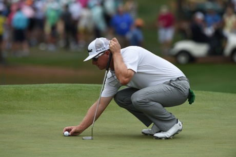 Charley Hoffman lines a putt on the 7th .