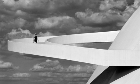A woman walks down a ramp in Brasília