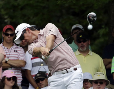 Justin Rose tees off.