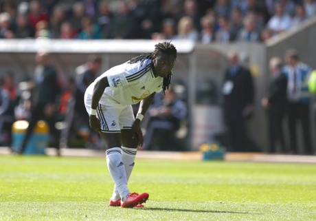 Bafetimbi Gomis pulls up with an injured hamstring.