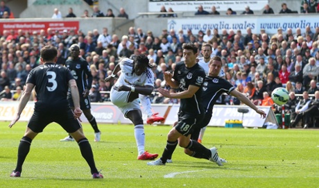 Bafetimbi Gomis almost scores with this shot but appears to pull his hamstring.