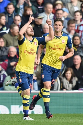 and looks to the sky for his celebration.