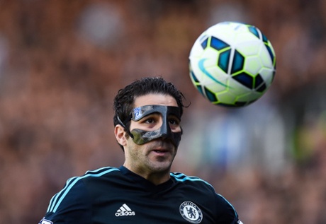 Cesc Fabregas wearing his Batman outfit/protective face mask.