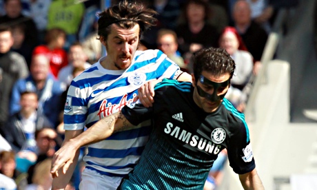 Cesc Fàbregas battles with QPR's Joey Barton