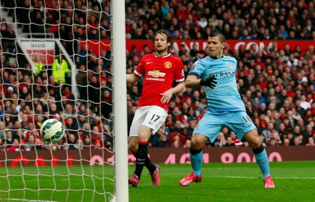 Sergio Aguero scores the first goal.