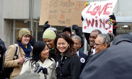 Gwen Migita, vice president of sustainability at Caesars Entertainment, with her wife, Cuc Vu, in Washington DC.
